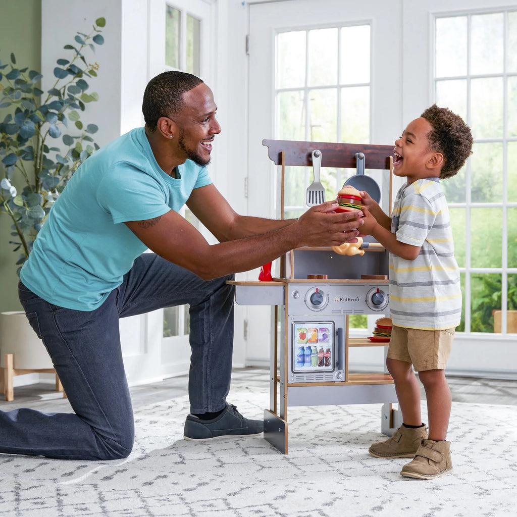 KidKraft Spin & Reveal Wooden Grill & Play Kitchen with moisture-Reveal Food & 21 Accessories